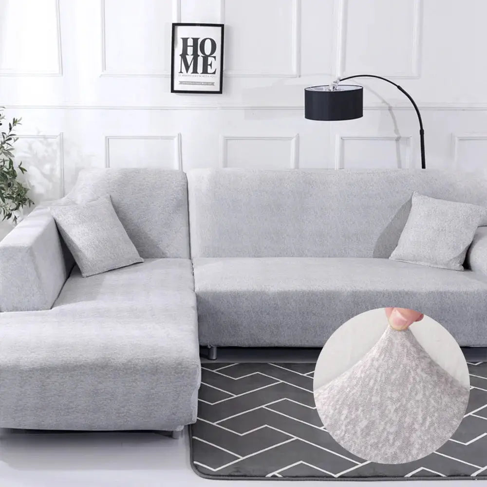 Gray stretch sofa slipcover for L-shaped corner sofa; elastic couch cover, textured fabric
