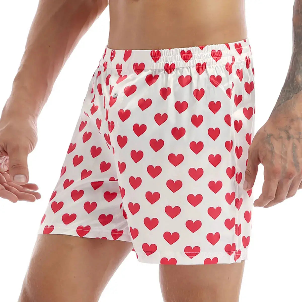 Men's heart‑print boxer shorts, white with red hearts, lightweight loose fit.