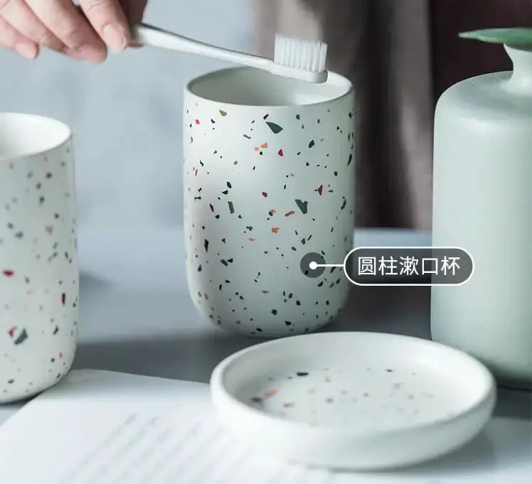 Terrazzo ceramic bathroom set by Simples Market; includes emulsion bottle, gargle cup and soap dish