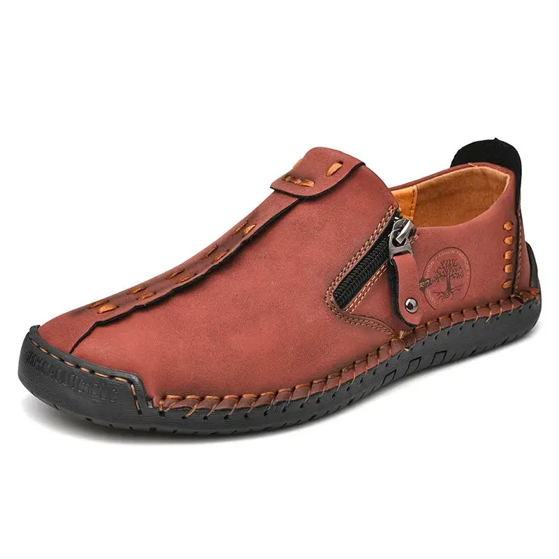Men's handmade leather slip-on loafers in brown by Simples Market with side zipper and moccasin stitching