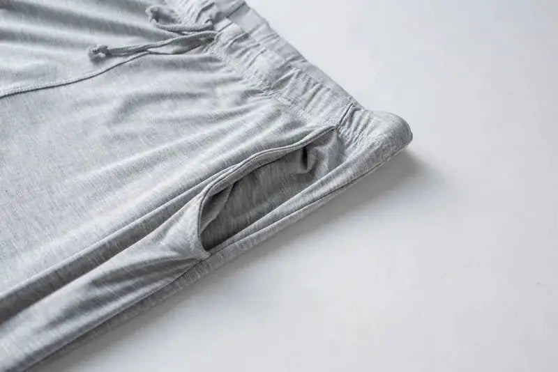 Men's spring and summer new modal pajamas two-piece short-sleeved trousers thin large size loose sports home wear suit sleepwear
