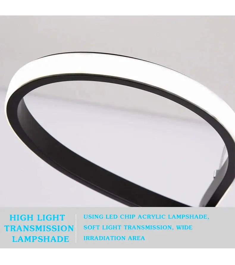 Circular LED pendant light ring, white exterior with black inner rim for modern kitchen island lighting