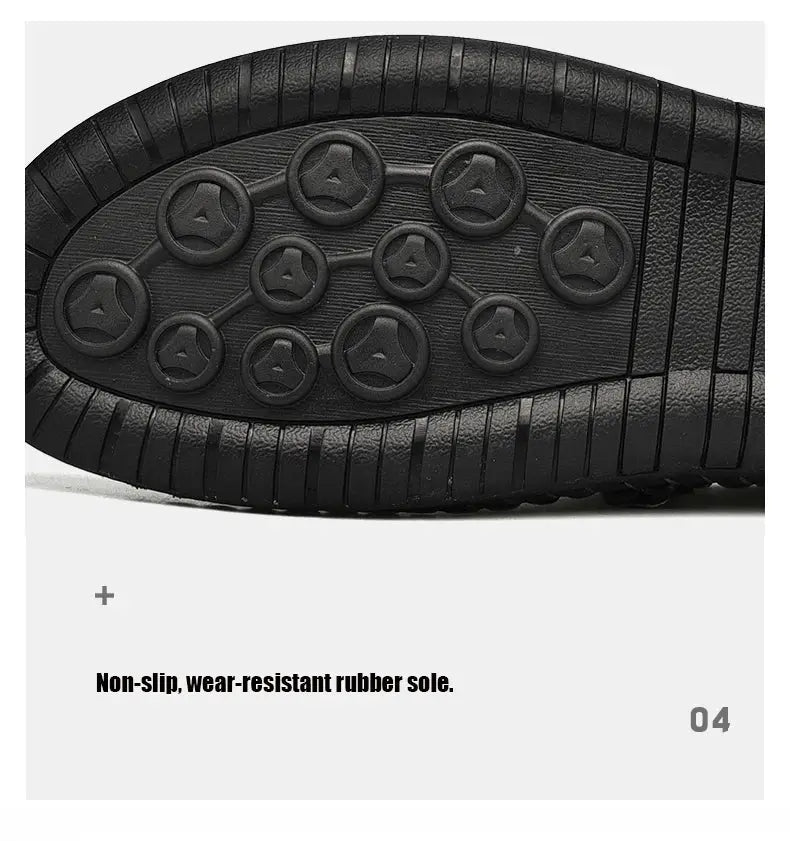 Men's leather slip-on loafers with a black non-slip rubber sole featuring circular tread studs for grip.