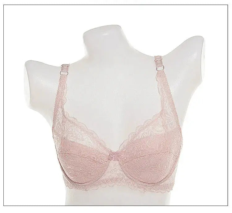 Women's pink lace underwire push-up bra displayed on a mannequin with adjustable straps.