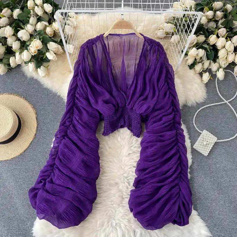 Purple draped chiffon blouse with V-neck and puff long sleeves for women