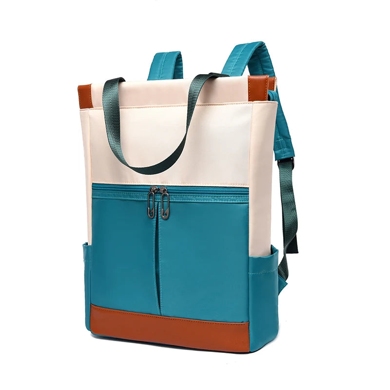Women’s waterproof Oxford backpack by Simples Market in teal/beige with brown base and front zip pocket