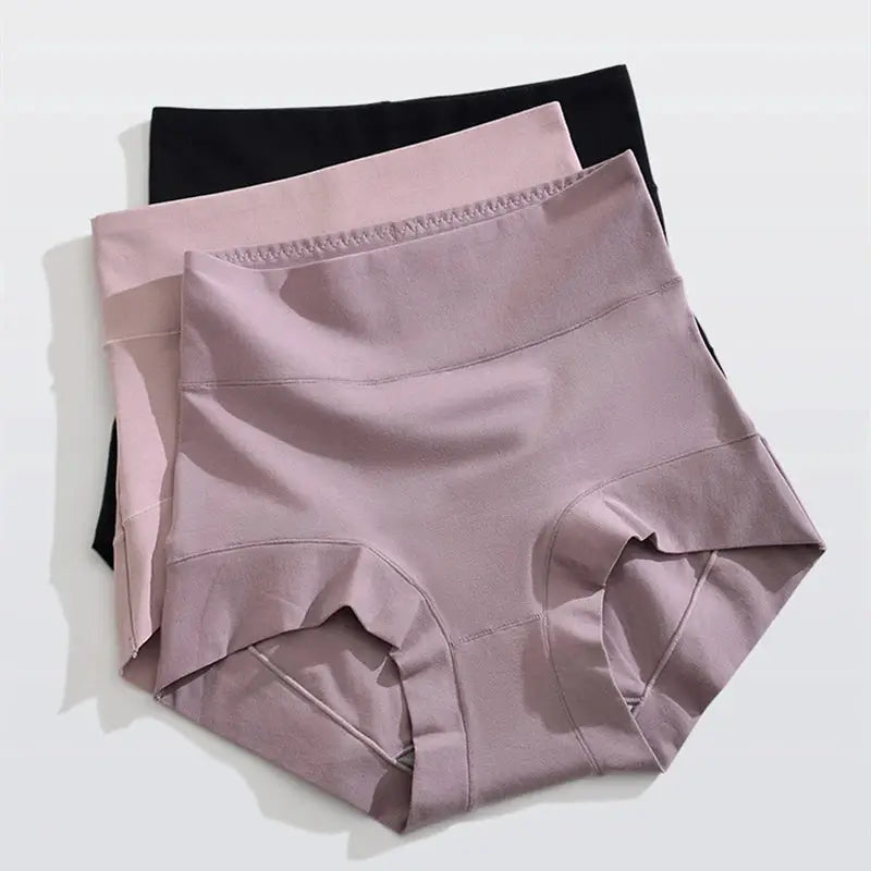Three pairs of 60S cotton high-rise panties for women in black, light pink, and dusty pink.