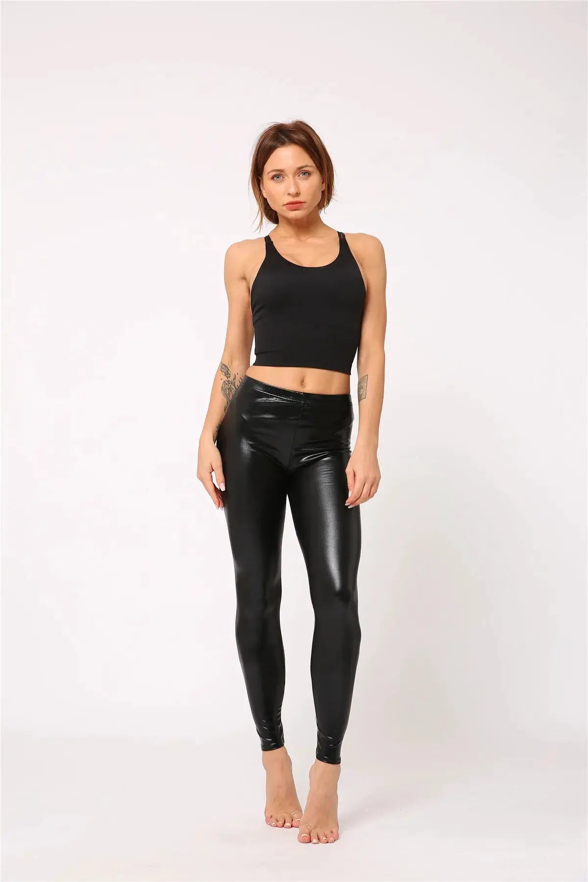 Ladies silver metallic laser leather leggings by Simples Market worn with a black crop top