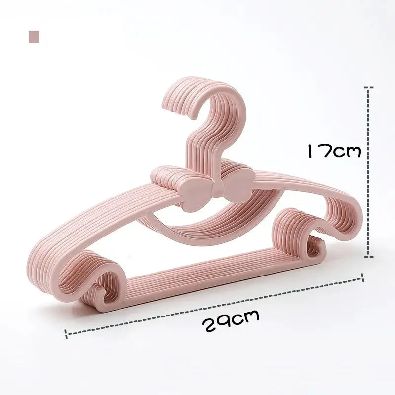 Simples Market pink plastic baby clothes hanger rack set, 5/10/20pcs, windproof multi-arm display, 17 cm high by 29 cm long
