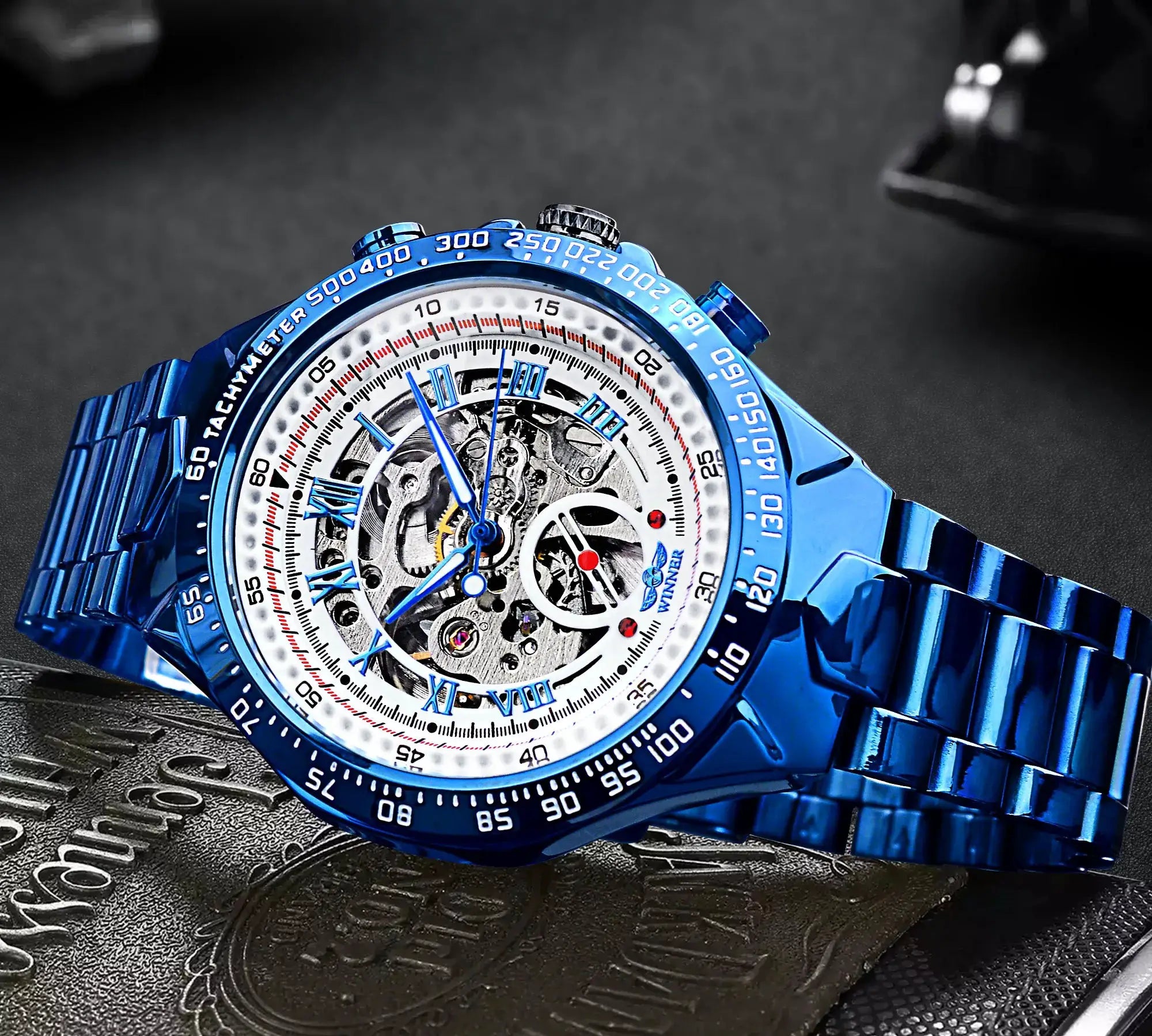 Winner blue skeleton mechanical watch with tachymeter bezel and stainless-steel band