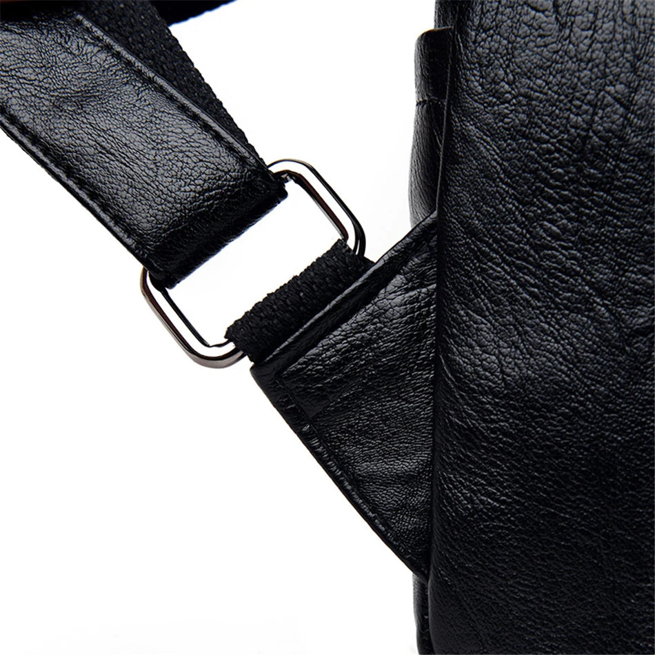 Genuine Women Soft Leather Backpack by Simples Market; black textured leather with metal buckle strap.