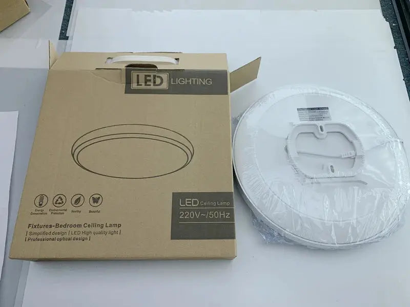 Two items: Simples Market LED Ceiling Lamp box and round white ceiling panel light.