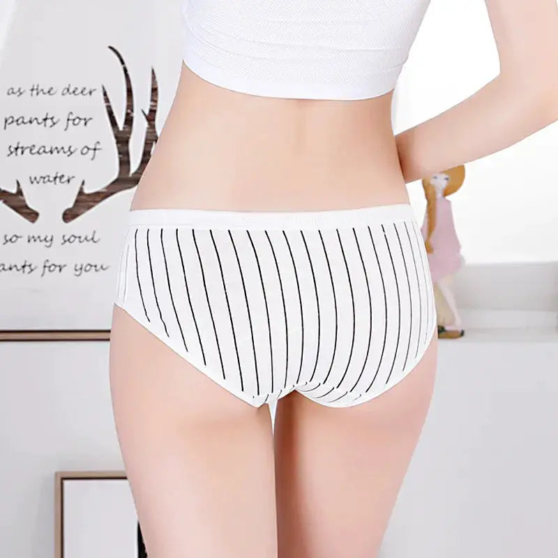 Cotton panties for women, white with black vertical stripes, back view.