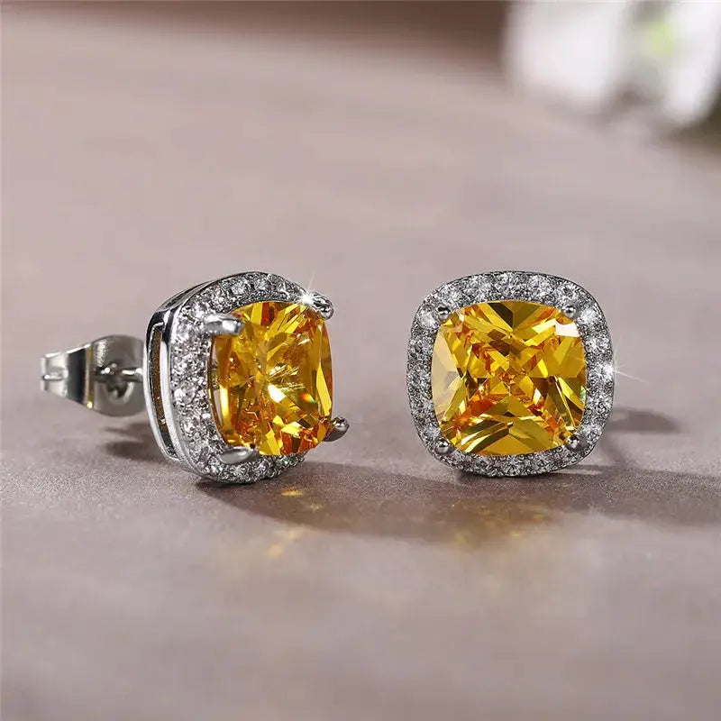Huitan cushion-cut stud earrings with yellow cubic zirconia halo in silver-tone metal; set of 2