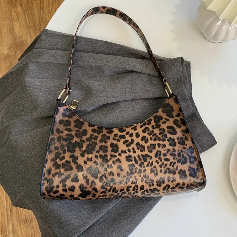 Leopard print PU leather shoulder bag for women by Simples Market.