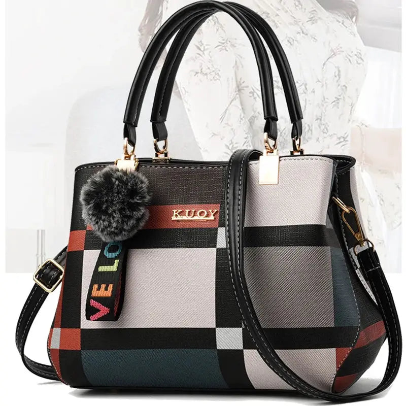 Handbag KUOY plaid PU leather with black handles, gold hardware, crossbody strap, and furry pom-pom accent