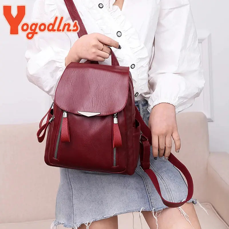 Yogodlns PU leather backpack for women, burgundy with double zippers and top flap.