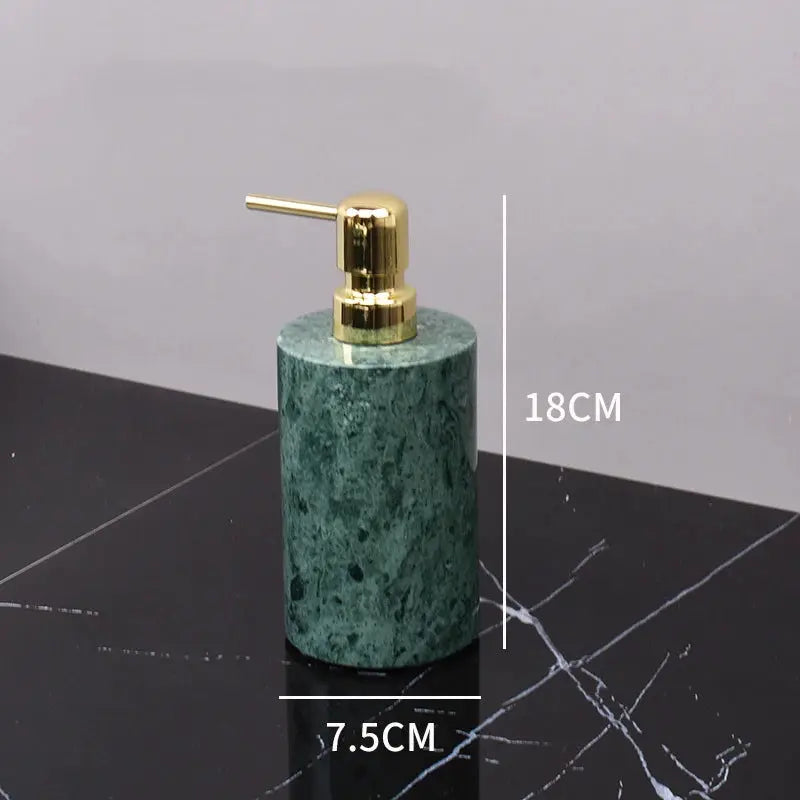 Soap dispenser made of green natural marble with a gold pump for bathroom vanity