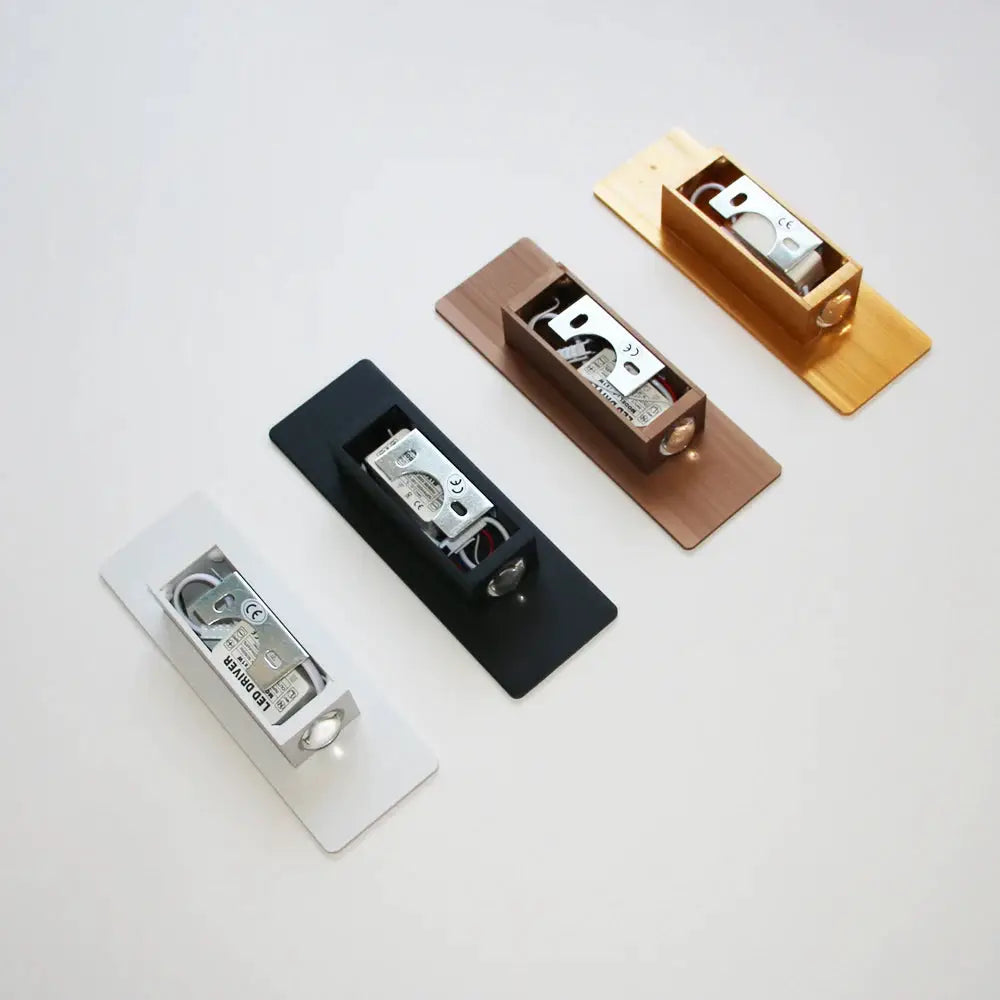 Modern aluminum LED indoor wall lamps; set of four in white, black, bronze, and gold finishes.