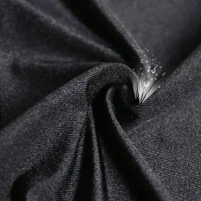 Women's black stretch leggings fabric close-up with shiny finish