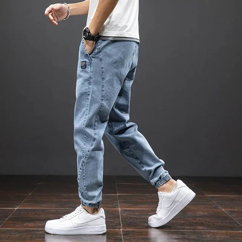 Men's blue cargo denim jogger pants with elastic cuffs by Simples Market