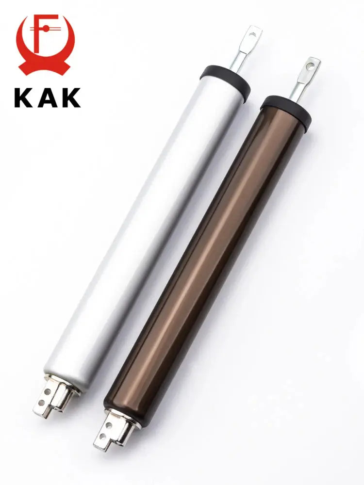 Two KAK pneumatic door closers with soft-closing action in silver and bronze finishes