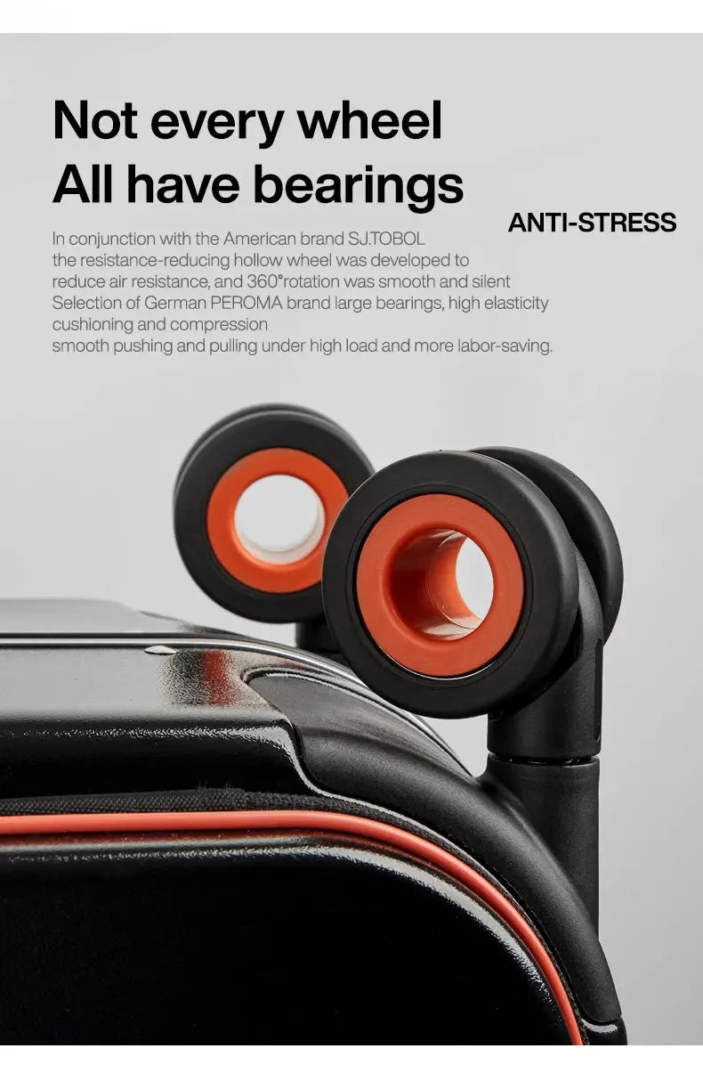 Simples Market Mixi carry-on suitcase wheels; close-up of black case with orange inner bearing rings