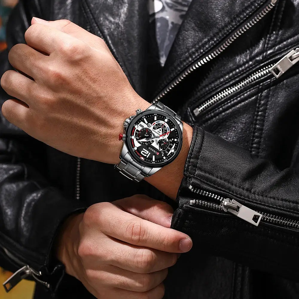 Curren men's stainless steel chronograph watch with black dial, red accents, and metal bracelet.