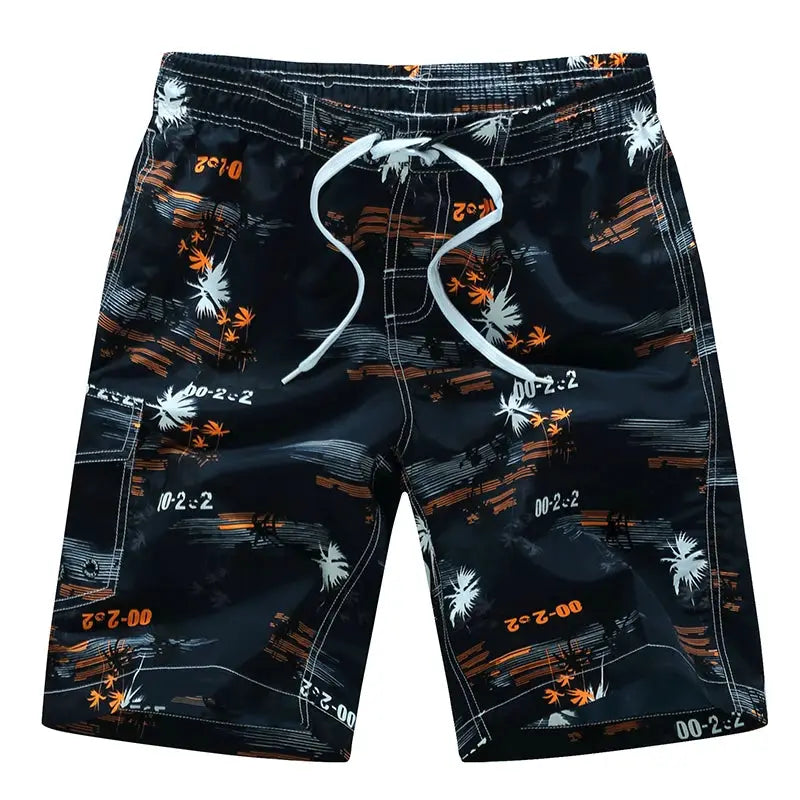 Men's surf board shorts in dark navy with palm tree print and white drawstring.