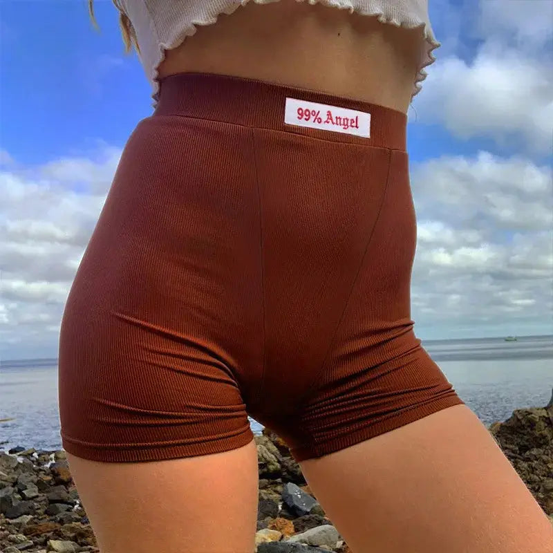 Biker shorts, brown ribbed-knit, high-waist with 99% Angel label on back waistband.