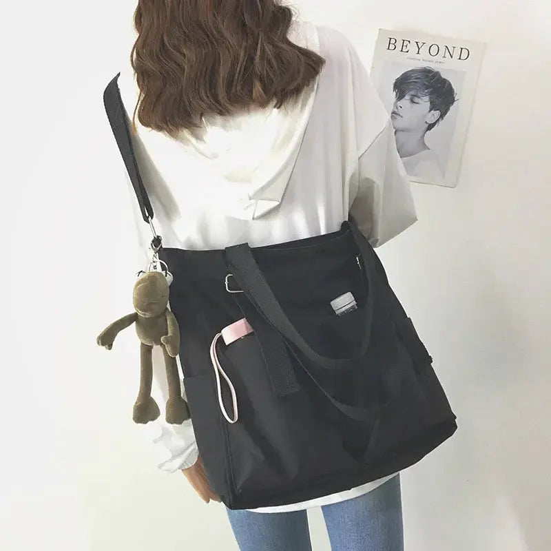 Waterproof Oxford large-capacity black women's handbag with top handles and crossbody strap