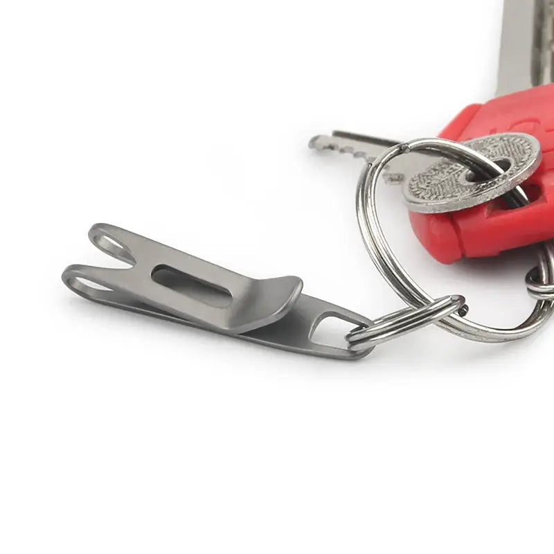 Titanium alloy key ring with folding clasp buckle, metallic gray.
