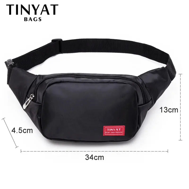 TINYAT black waist bag with adjustable strap and red logo patch; compact fanny pack, 34cm wide x 13cm high.