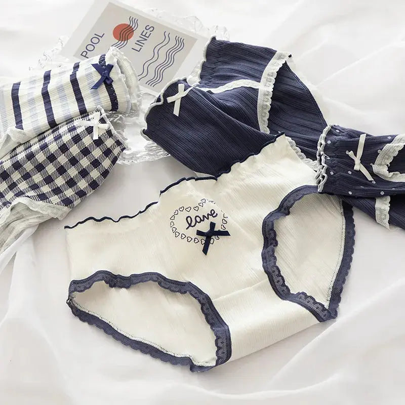 Five-piece cotton women's underwear set in navy, white, striped and checkered with bows and lace trims