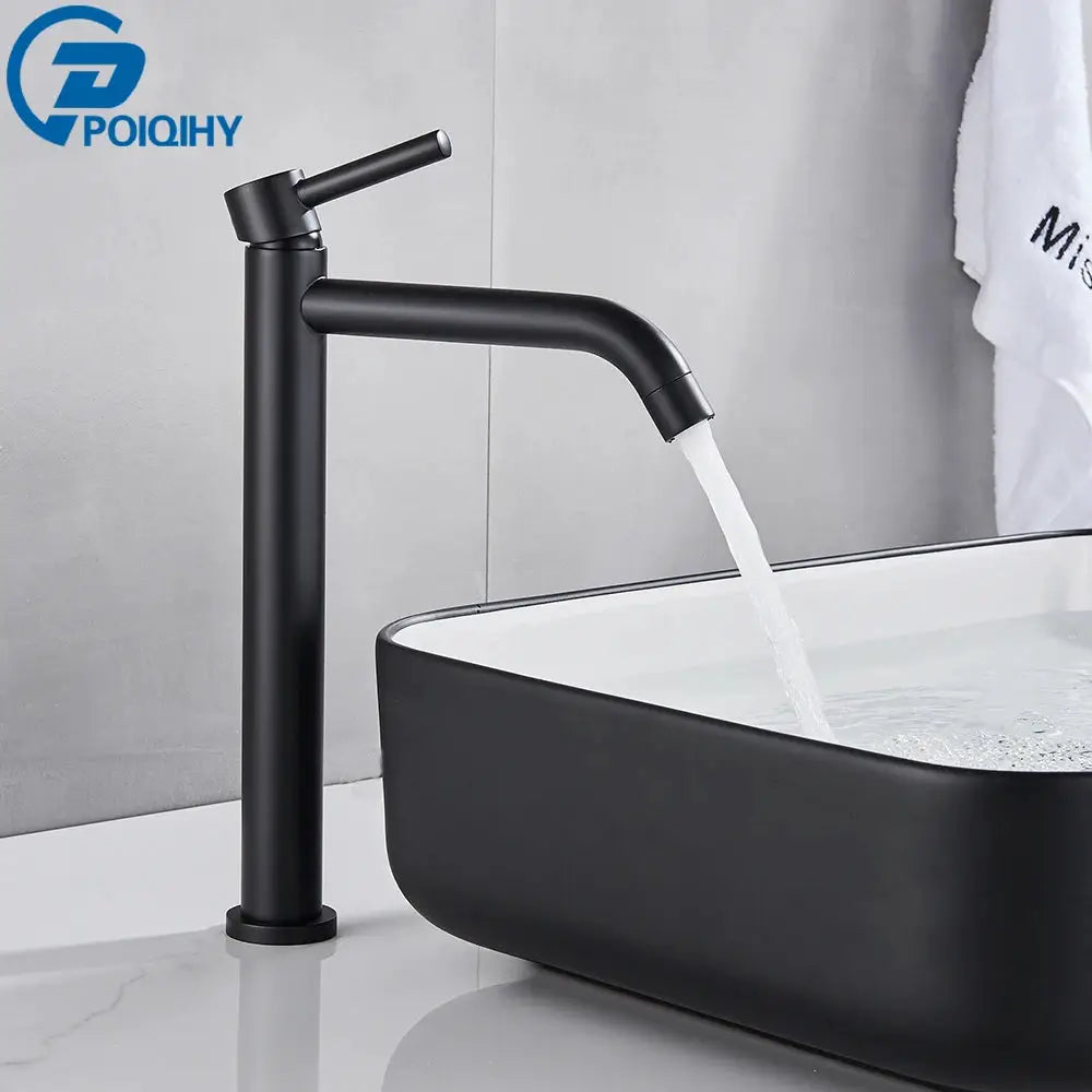 Black matte basin faucet with tall cylindrical body, single-lever handle and curved spout over a black washbasin