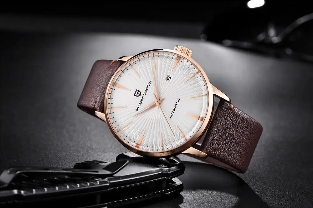 Pagani Design men's gold-tone automatic wristwatch with brown leather strap and white sunburst dial, date window.