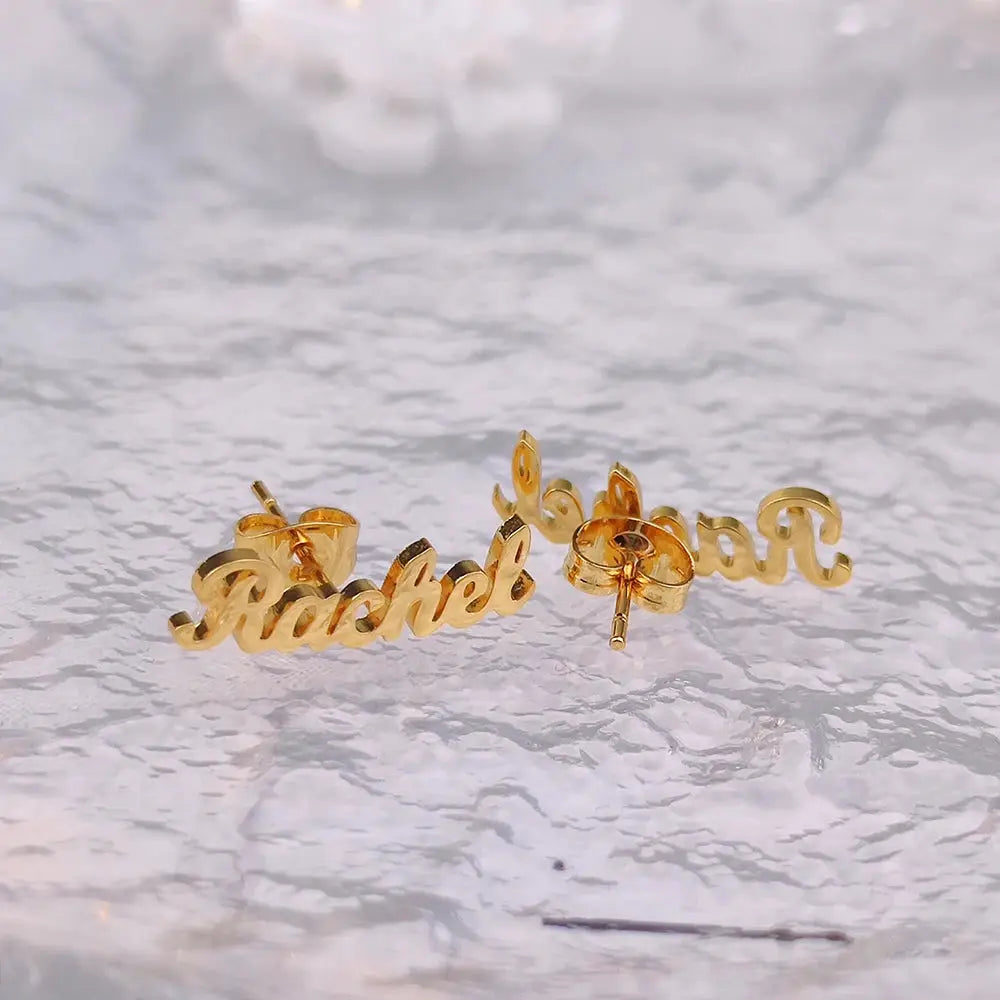 Custom name earrings in gold-tone stainless steel, cursive script, pair