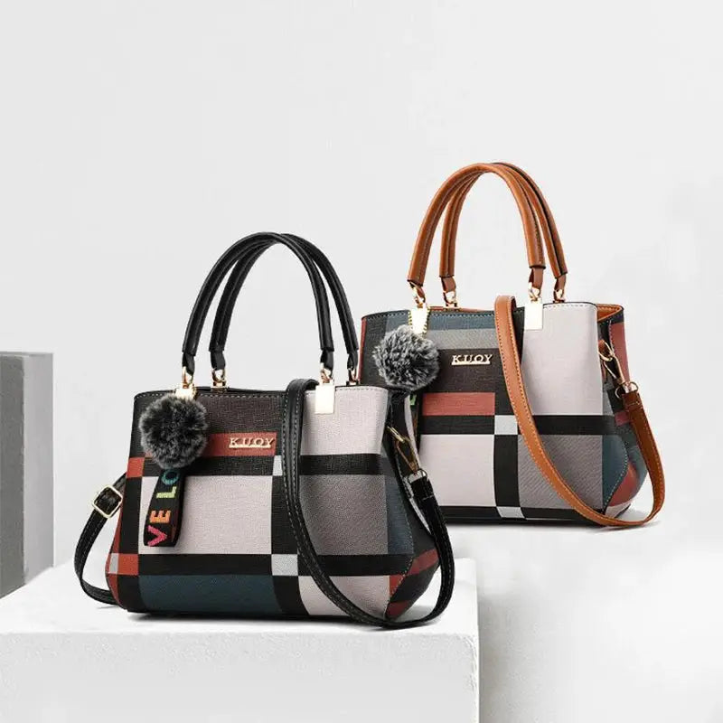 Two designer PU leather handbags by Simples Market, geometric color-block crossbody and tote bags with pom-pom charms.