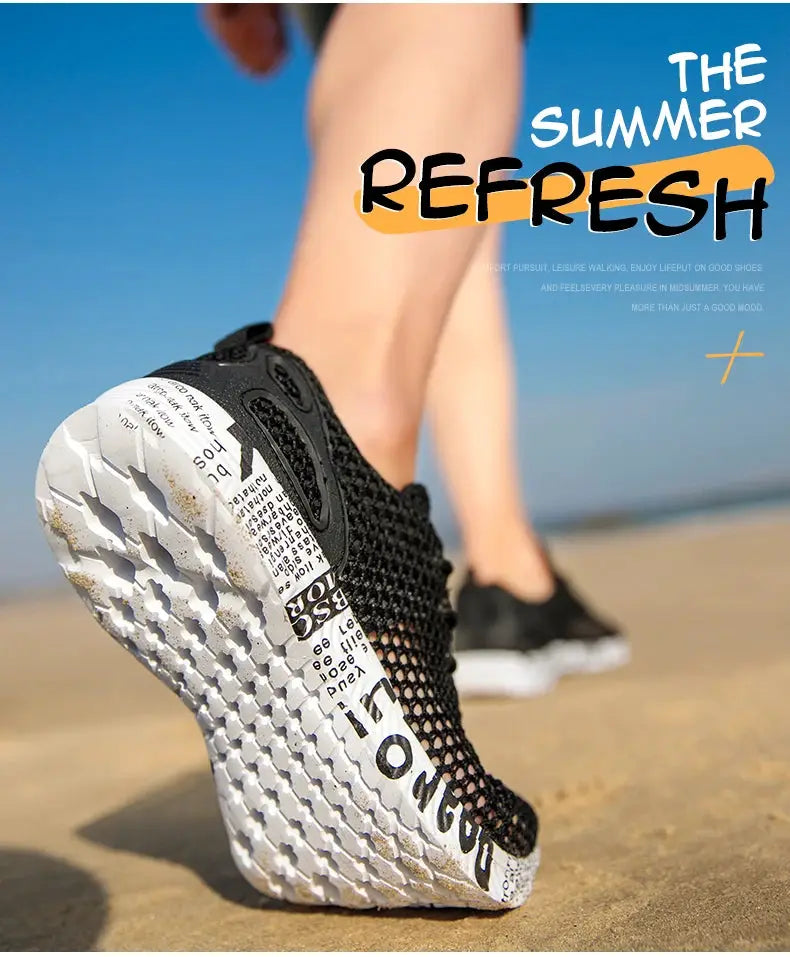 Men's water shoes with black mesh upper and foam white sole, beach sneakers
