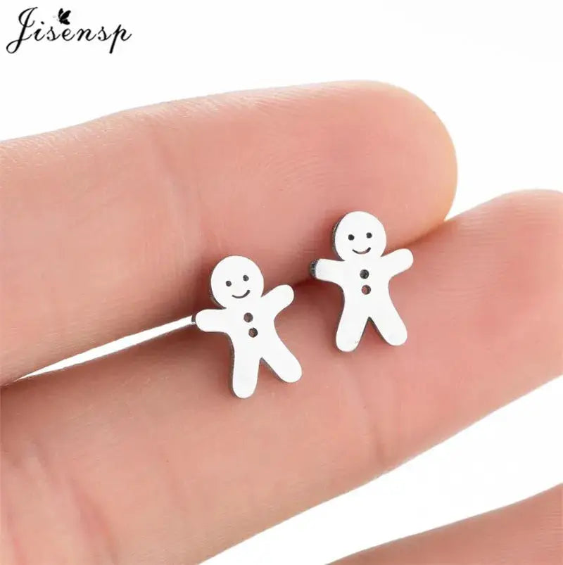 Stainless steel stud earrings, pair of silver-tone smiling gingerbread-man designs.