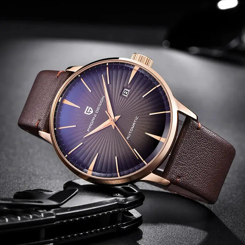 Pagani Design men's automatic wristwatch with gold-tone case, blue sunburst dial, date window, brown leather strap