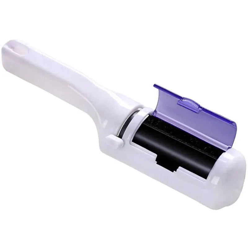 Handheld electrostatic lint remover brush with purple lid on white body for clothing and pet hair