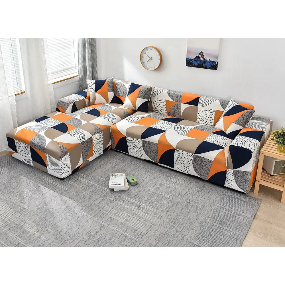 L-shaped sofa cover in orange, navy and beige geometric print; stretch elastic slipcover for corner sofa