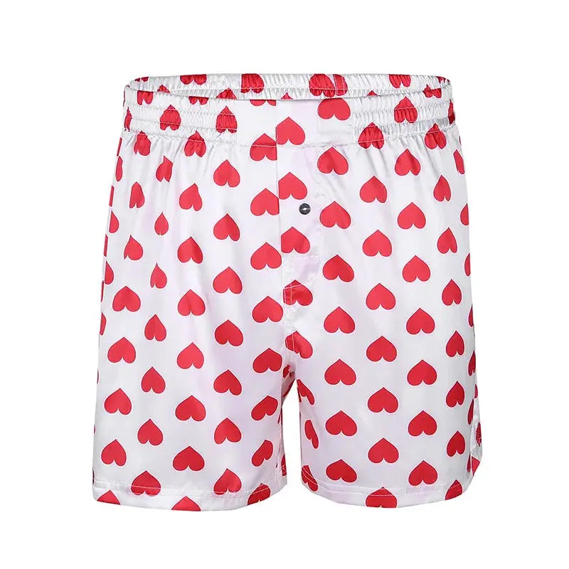 Men's heart-print boxer shorts in white with red hearts; lightweight beachwear
