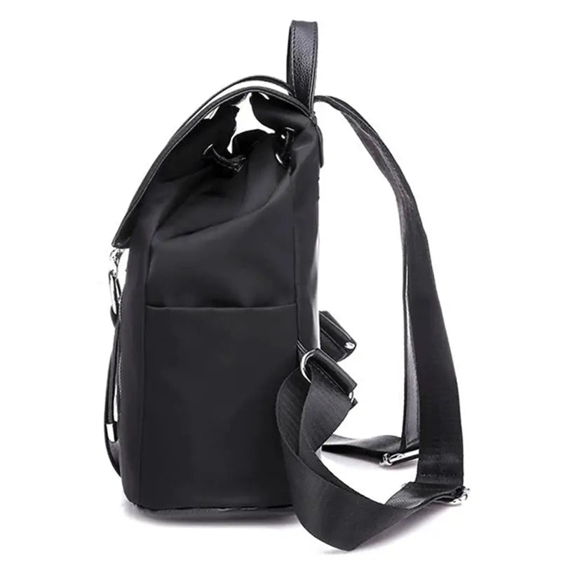 Black nylon women's backpack with adjustable strap and outer side pocket