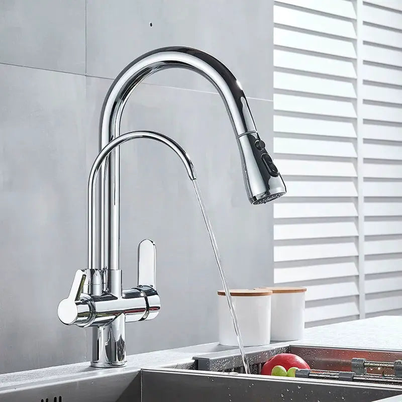 Chrome pull-out kitchen faucet with high-arc spout and dual handles over the sink.
