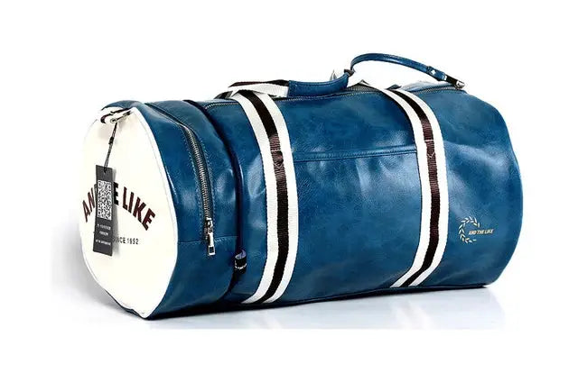 Sport gym bag by Simples Market; blue faux leather duffel with white end caps and striped straps