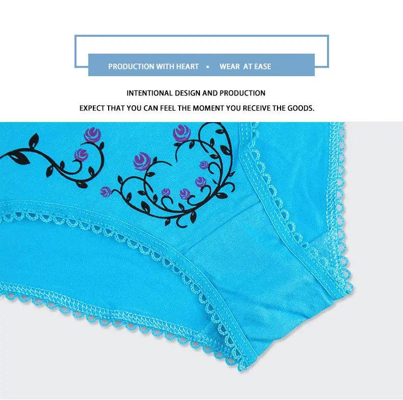 Women's cotton panties by Simples Market, blue bikini briefs with lace trim and floral embroidery.