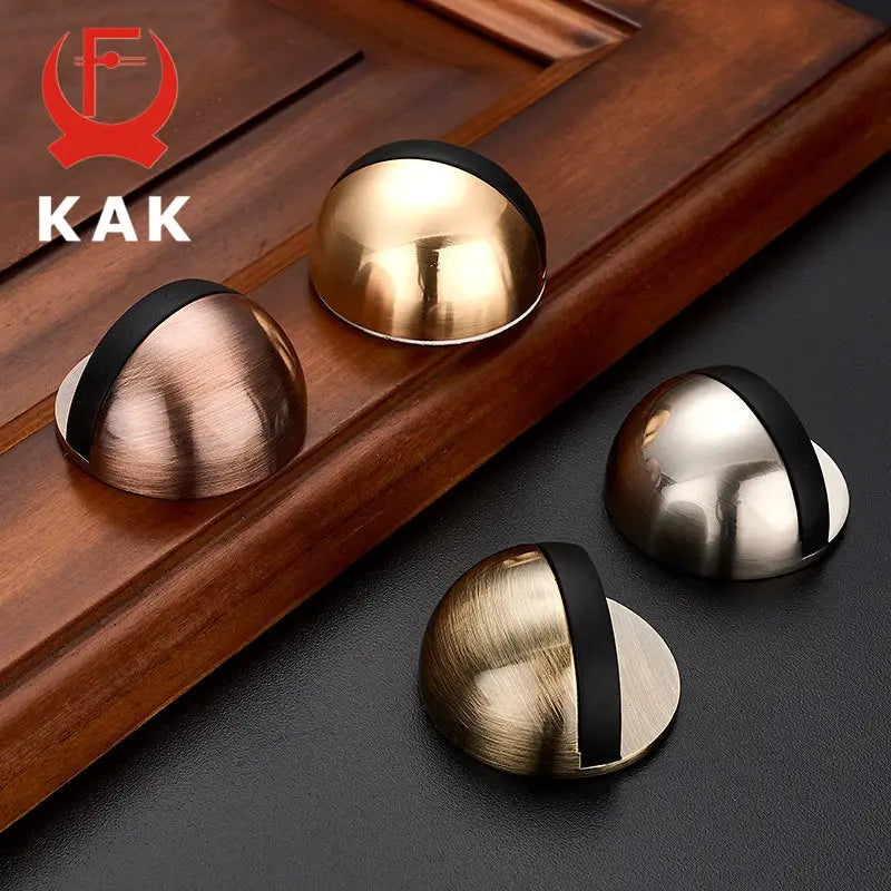 KAK cabinet lock caps in copper, bronze, gold, and silver finishes with black bands, four pieces