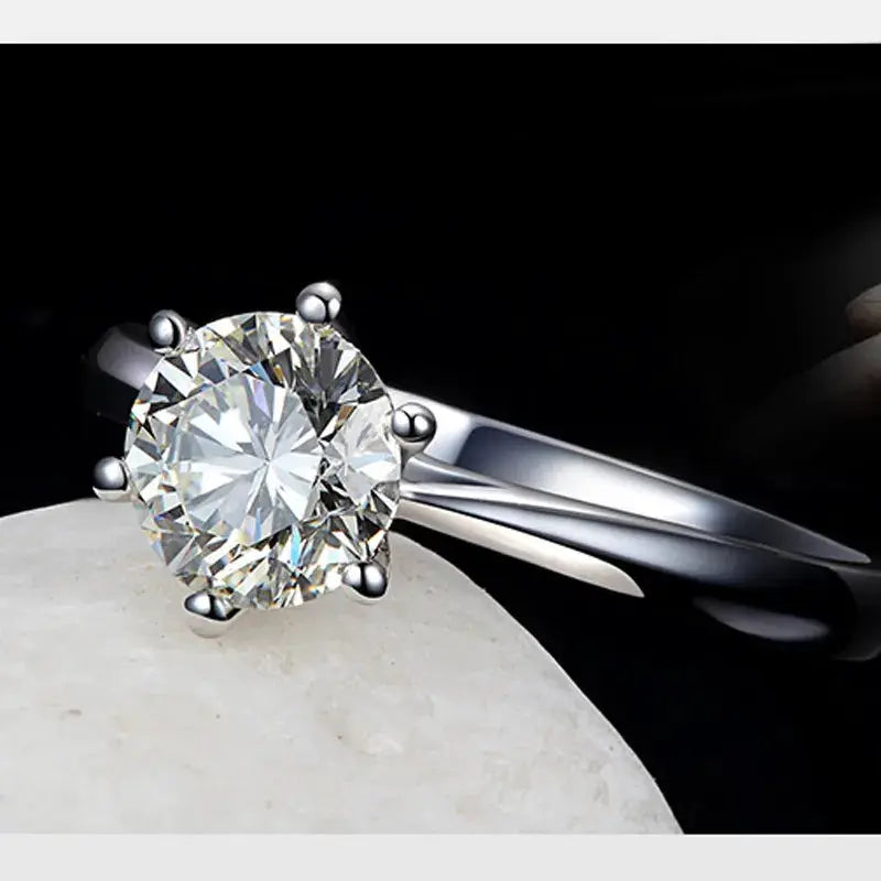 S925 sterling silver engagement ring with round Austrian crystal solitaire on a polished band